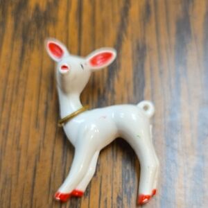 Charming White and Red Deer Figurine
